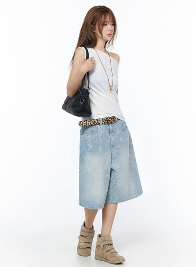LEWKIN Asymmetric One-Shoulder Top IU525 White S/M side shot on model styled with leopard-print denim shorts and black shoulder bag