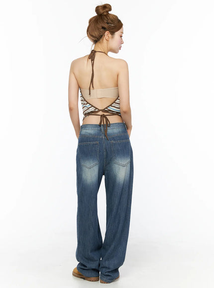Auralie Vintage Washed Wide Leg Jeans CL502 Blue back full-body view on model styled with open-back halter top showing back pockets and faded wash