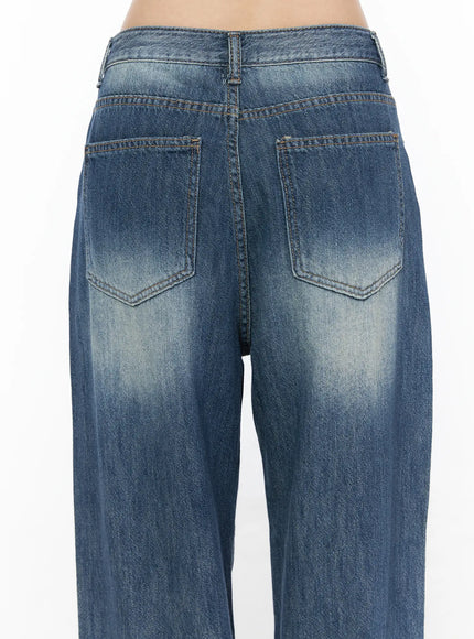 Auralie Vintage Washed Wide Leg Jeans CL502 Blue close-up back detail showing dual pockets chevron topstitching and vintage fade wash on denim