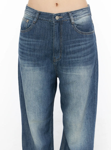 Auralie Vintage Washed Wide Leg Jeans CL502 Blue close-up detail of front waistband showing silver button coin pocket and washed denim texture