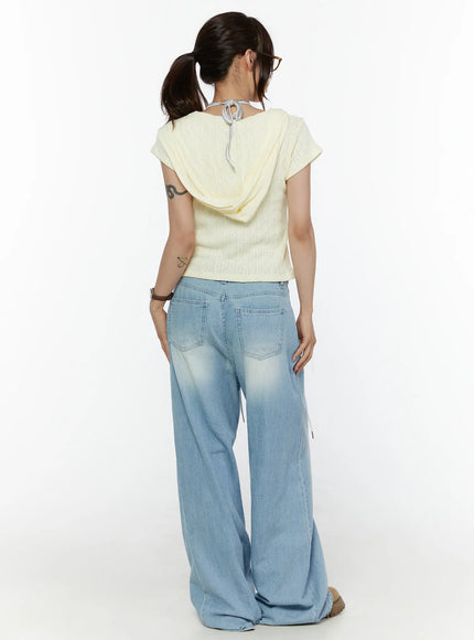 Aurelie Drawstring Washed Wide Leg Jeans CL507 Light blue full back shot on model styled with yellow hooded knit top showing overall silhouette from behind