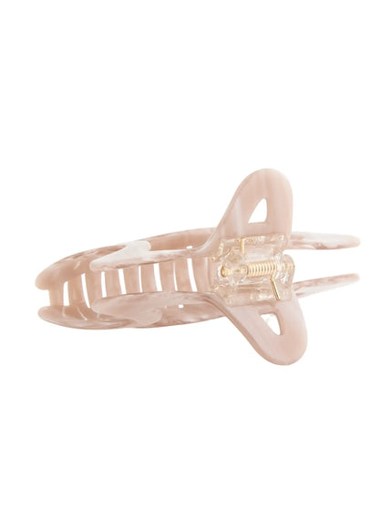 Aurora Hair Clip IL503 pink marble side close-up showing transparent spring mechanism and interlocking acrylic teeth structure