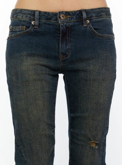 Aveli Vintage Low-Rise Flare Jeans CL515 Dark blue close-up front detail of low-rise waistband gold button hardware and front pockets