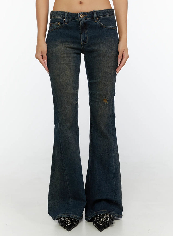 LEWKIN Aveli Vintage Low-Rise Flare Jeans CL515 Dark blue front view on model crop top styled with dark wash flare silhouette and black boots Size S