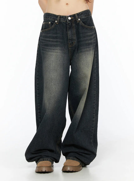 Avie Vintage Wash Wide Leg Jeans CU530 Dark blue front mid-body view on model showing waistband front pockets wide-leg denim with contrasting faded yellow wash
