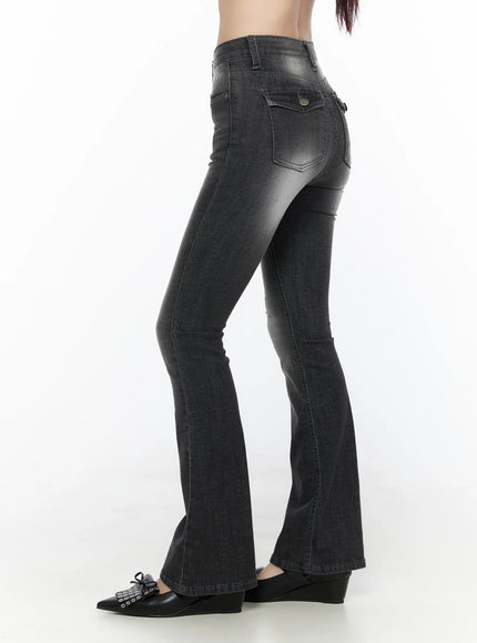 Avielle Classic Bootcut Jeans CL527 Black side view on model, showing flared bootcut silhouette, back pocket detail, and faded wash denim texture