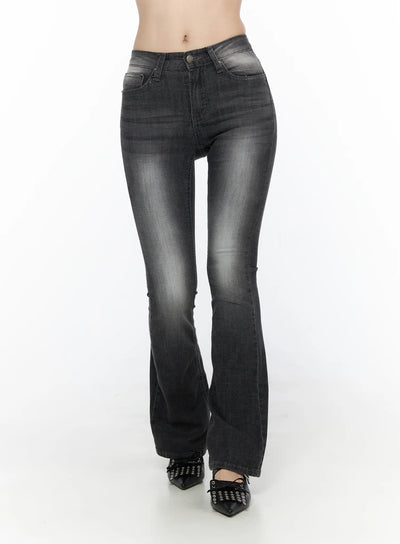 LEWKIN Avielle Classic Bootcut Jeans CL527 Black front view on model, washed black denim flare hem, worn with black bow flats, Size S