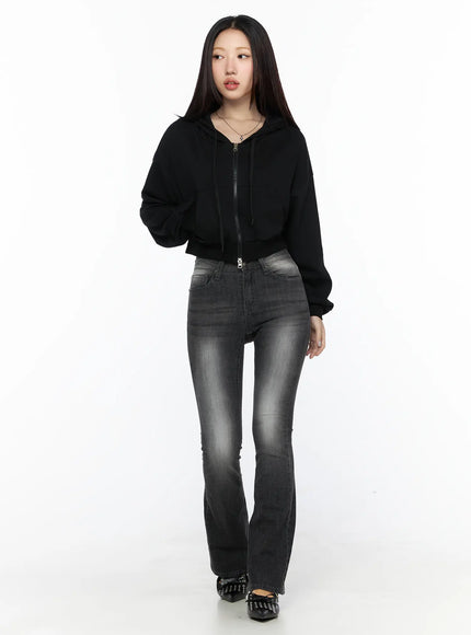 Avielle Classic Bootcut Jeans CL527 Black full-body front shot on model walking, styled with black zip-up crop hoodie and bow-detail flats