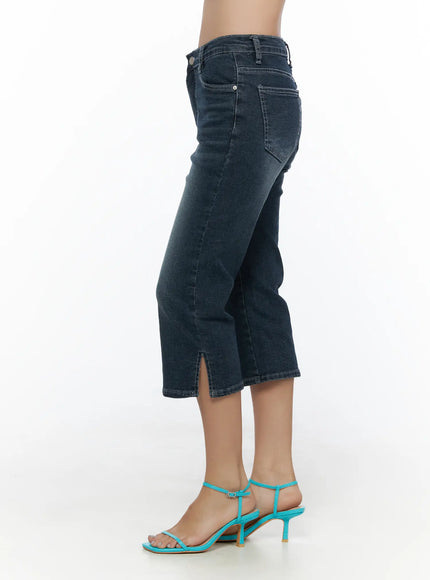 Axel Slit Capri Jeans CL510 dark blue side shot on model showing slim silhouette, side slit hem, back pocket, and teal heeled sandals