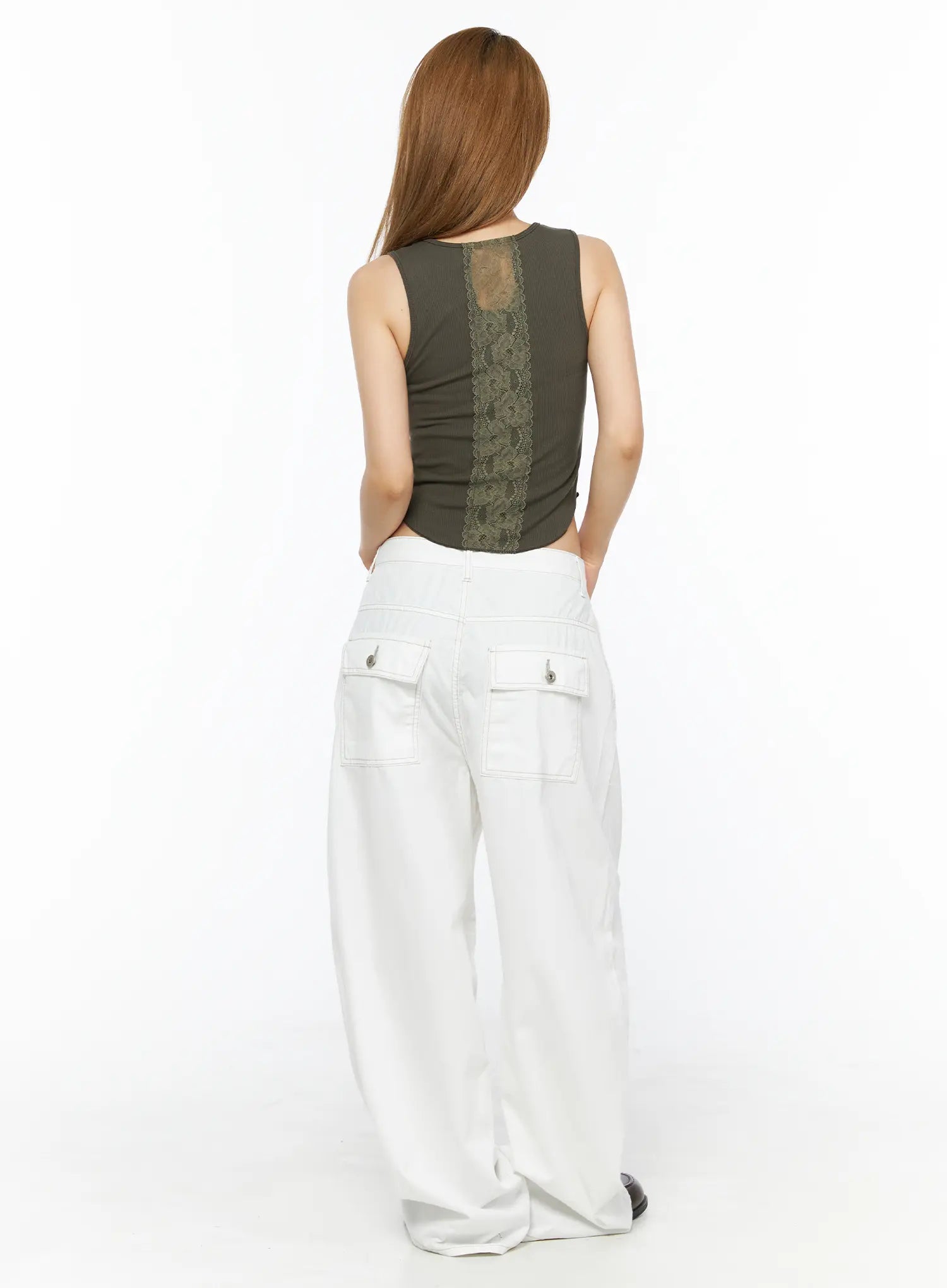 Back Lace Ribbed Tank Top CL502 Dark green back full-length shot on model showing center vertical lace panel, styled with white wide-leg cargo pants and dark loafers