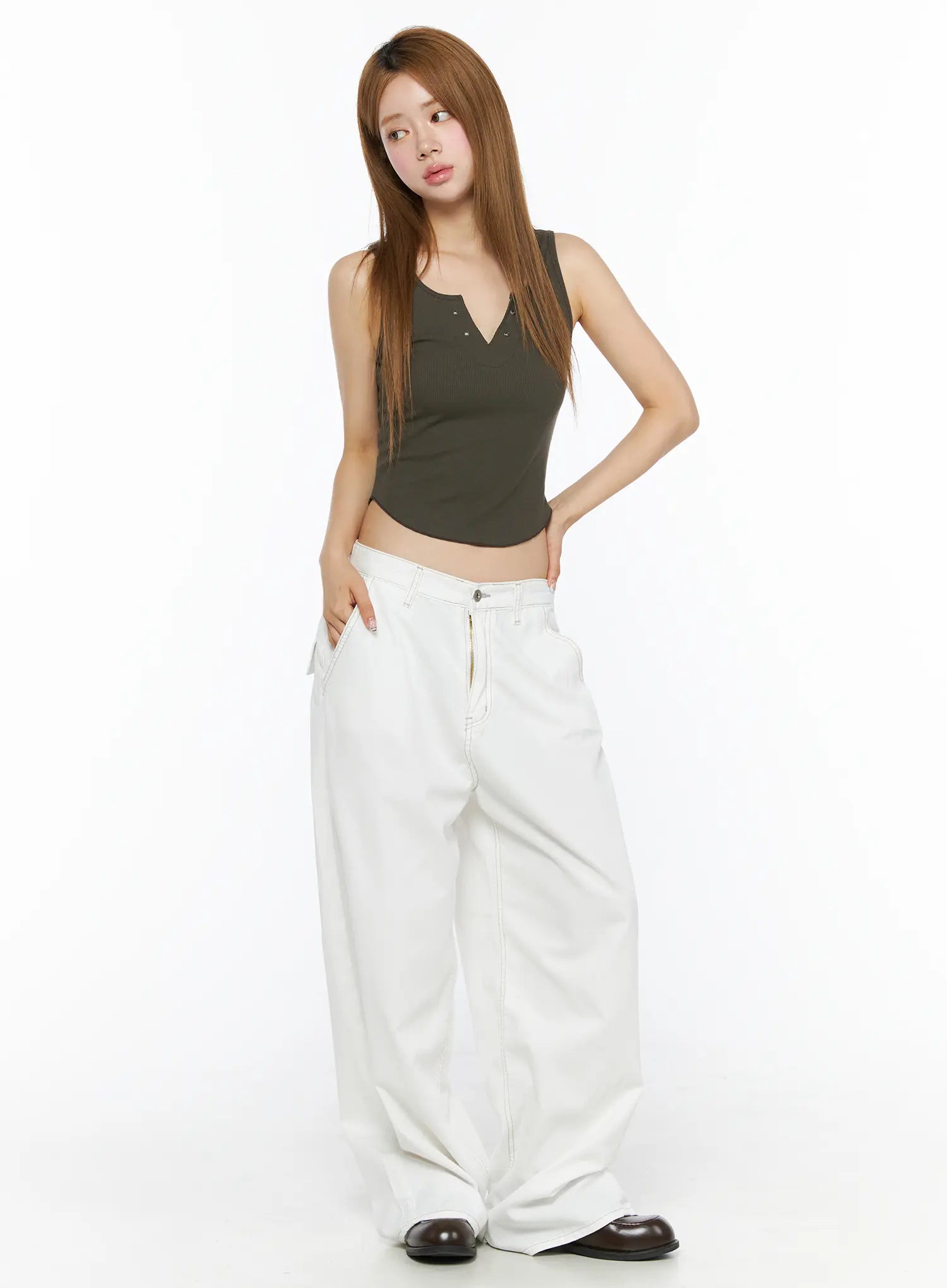 Back Lace Ribbed Tank Top CL502 Dark green full-length front shot on model paired with wide-leg white jeans and dark loafers, showing cropped ribbed silhouette