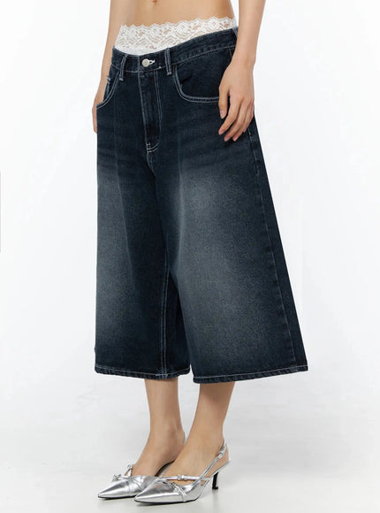 Back Print Jorts IL509 Dark blue side view on model, cropped shot revealing wide flared leg hem, lace waistband trim, silver slingback heels