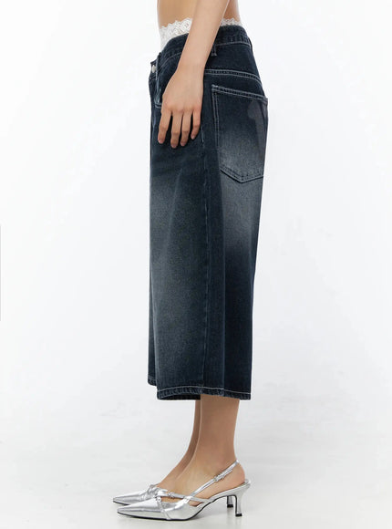 Back Print Jorts IL509 Dark blue side view on model, full lower-body shot showing side profile of wide-leg silhouette and silver heels