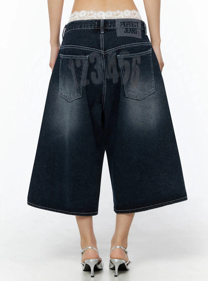 Back Print Jorts IL509 Dark blue back view on model, full lower-body shot displaying PERFECT JEANS patch, number graphic print, and back pockets