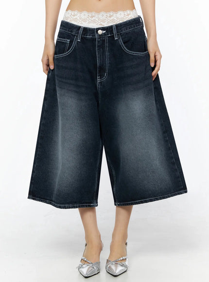 LEWKIN Back Print Jorts IL509 Dark blue front view on model, cropped shot showing wide-leg washed denim with white contrast stitching and lace waistband peek