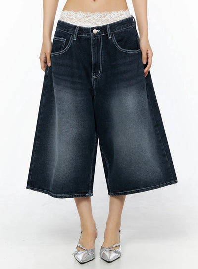LEWKIN Back Print Jorts IL509 Dark blue front view on model, cropped shot showing wide-leg washed denim with white contrast stitching and lace waistband peek