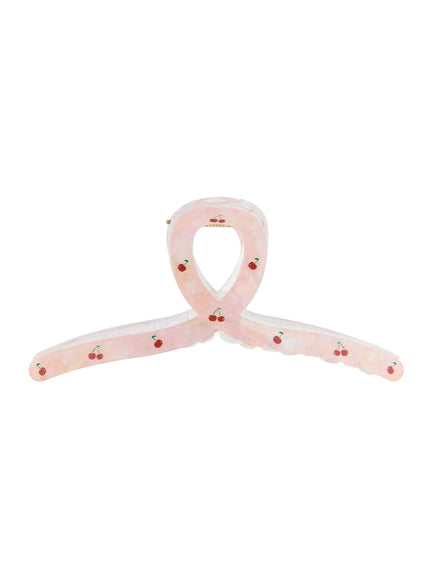 LEWKIN Baerry Hair Pin IL514 pink front view flat lay showing ribbon-loop bow shape with red cherry print on pearlescent acrylic
