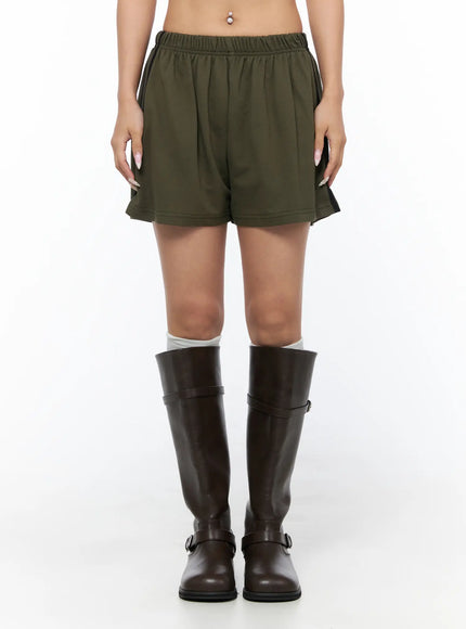Banded Cotton Shorts CU524 Dark green front cropped shot on model showing elastic waistband, relaxed fit, and clean front panel