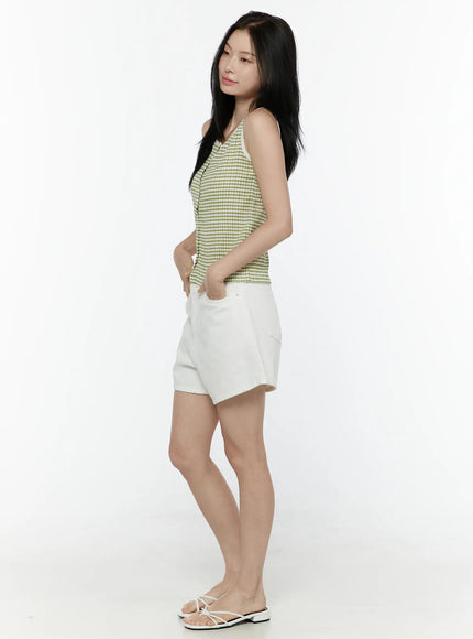 Basic Cotton Shorts IL506 White side full-body view on model styled with green gingham tank top, hand in pocket, white strappy sandals