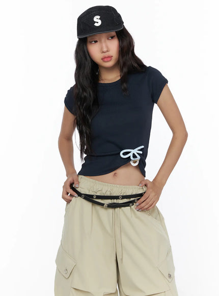 LEWKIN Basic Crewneck Tee CL510 Dark blue front shot on model size S/M with light blue bow detail, styled with beige cargo shorts and black cap