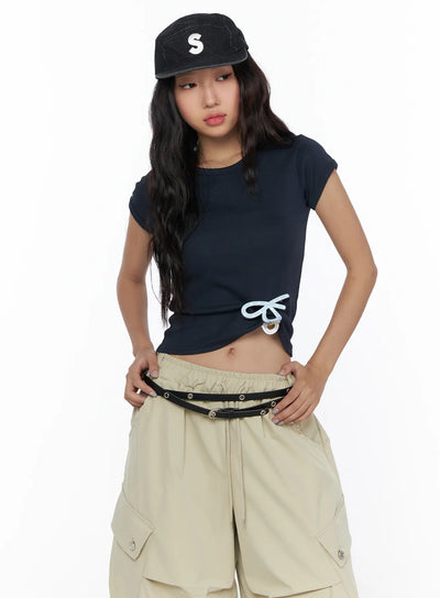 LEWKIN Basic Crewneck Tee CL510 Dark blue front shot on model size S/M with light blue bow detail, styled with beige cargo shorts and black cap