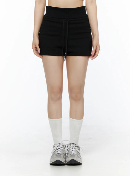 LEWKIN Basic Drawstring Lounge Shorts IU525 Black front close-up on model size S/M showing wide ribbed waistband and drawstring tie