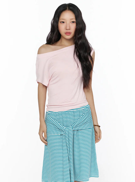 Basic One-Shoulder Tee CL513 Pink front shot on model wearing asymmetric one-shoulder neckline fitted tee styled with teal stripe skirt