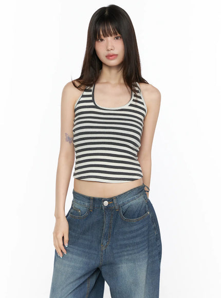 Basic Striped Halter Top CL522 charcoal front view on model standing upright paired with wide-leg blue denim jeans