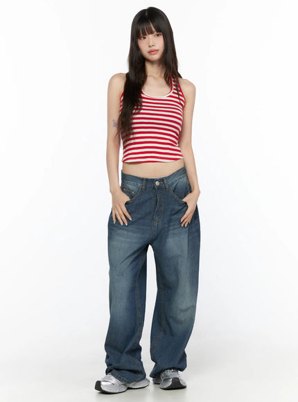 Basic Striped Halter Top CL522 Red full-body front view on model with hands in pockets styled with baggy washed denim and silver sneakers