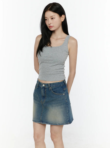 Basic Tank Top IL506 Gray three-quarter front shot on model looking to side showing square neckline ribbed texture cropped fit styled with vintage denim mini skirt