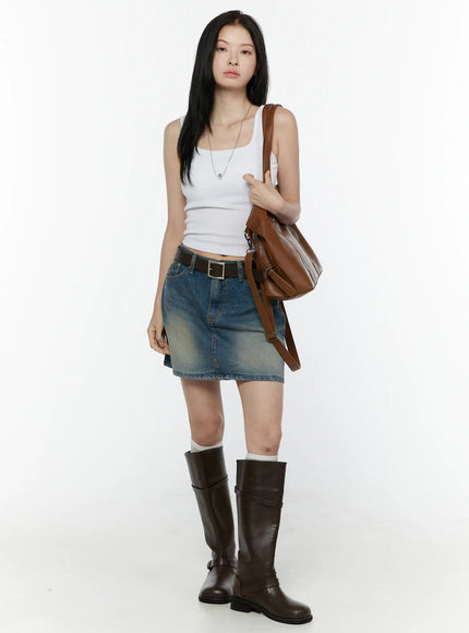 Basic Tank Top IL506 White full-body front shot on model carrying brown shoulder bag with belt-styled denim skirt and knee-high boots casual street styling