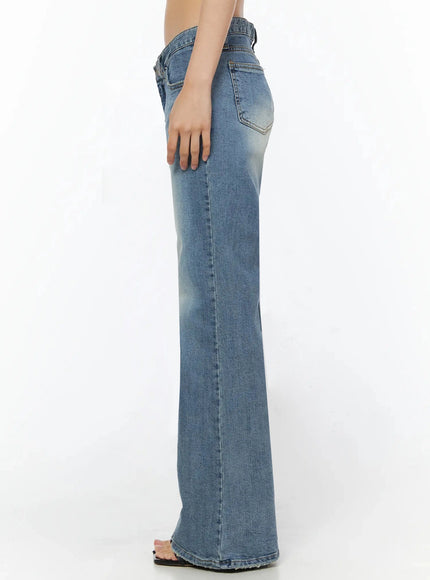 Bay Low Rise Bootcut Jeans IL509 Blue side shot on model showing slim thigh to wide flared hem silhouette with faded wash and back pocket detail