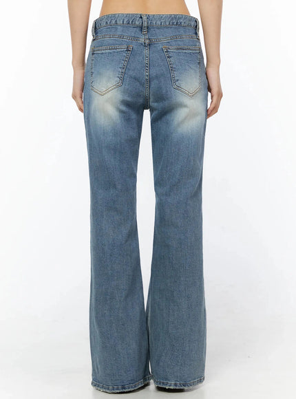 Bay Low Rise Bootcut Jeans IL509 Blue back shot on model showing double back pockets low-rise waistband and wide bootcut flare with faded wash denim