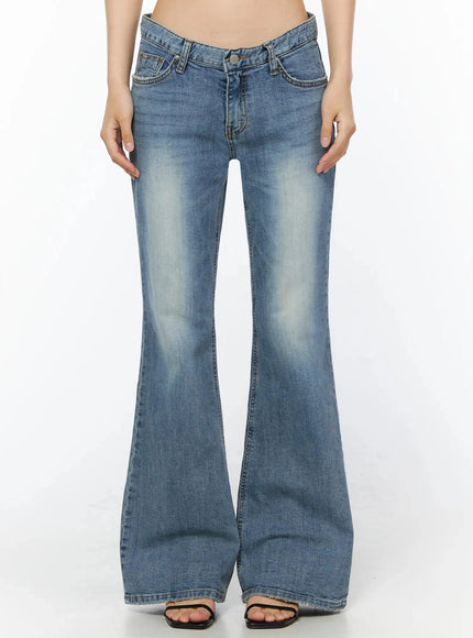 LEWKIN Bay Low Rise Bootcut Jeans IL509 Blue front crop shot on model size S showing low-rise waistband V-notch and flared leg with faded wash denim