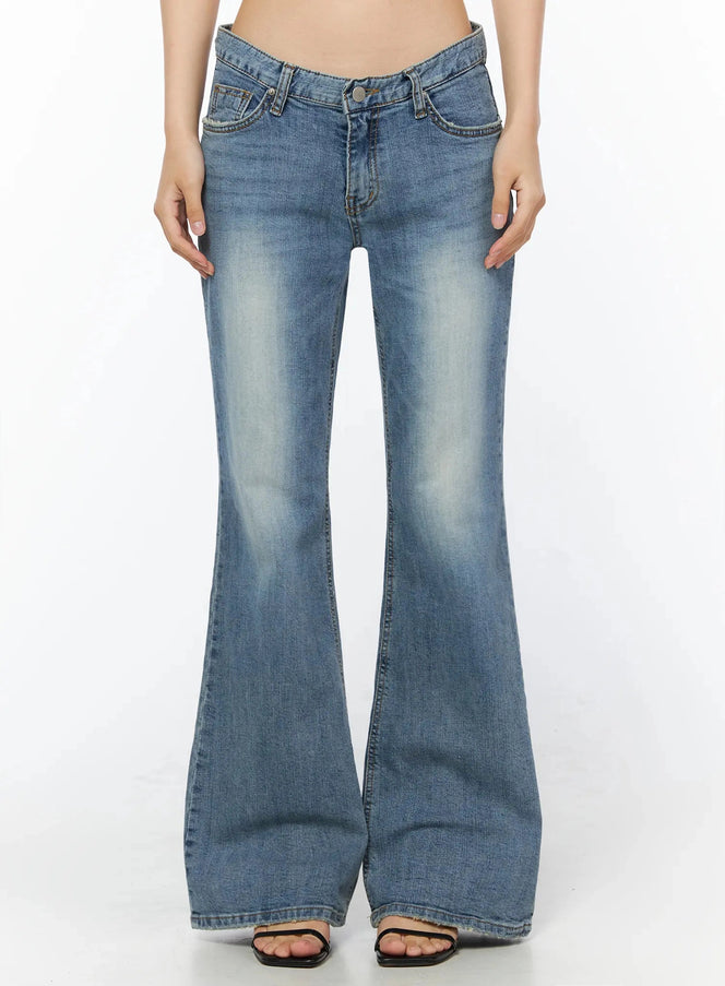 LEWKIN Bay Low Rise Bootcut Jeans IL509 Blue front crop shot on model size S showing low-rise waistband V-notch and flared leg with faded wash denim