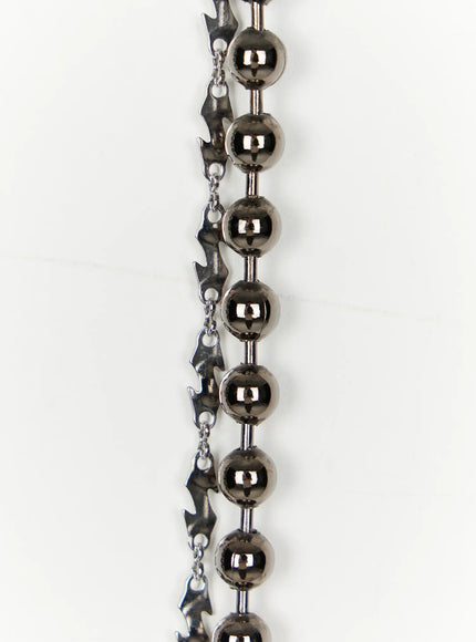 Beaded Layered Chain IL509 Silver close-up detail shot highlighting polished gunmetal ball beads and jagged silver charm links on layered chain