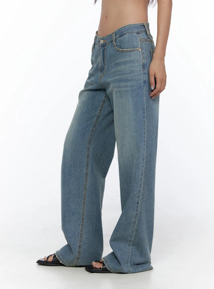 Beau Low-Rise Wide Jeans CL510 Blue side view on model showing wide-leg silhouette, low-rise cut, and washed denim texture with black sandals