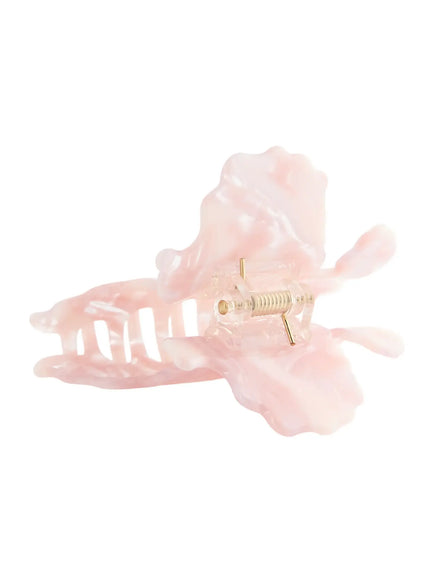 Belle Hair Clip IL503 pink detail view showing gold coil spring hinge mechanism and open claw teeth from inner side