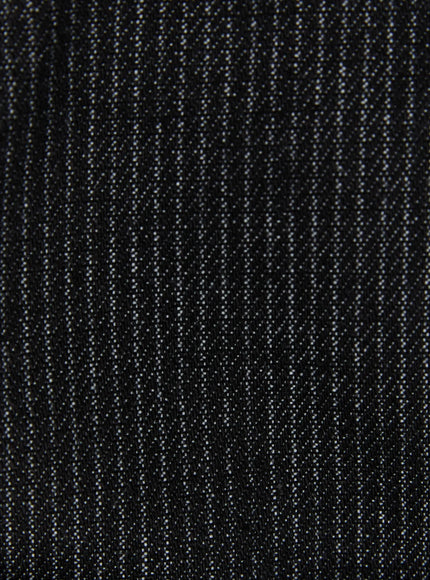 Belt Detail Micro Shorts IL509 Black close-up fabric texture detail showing black twill weave with subtle salt-and-pepper yarn texture