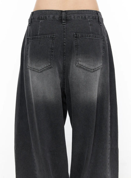 Ben Washed Wide Leg Jeans CL501 Black close-up back detail shot showing dual back pockets with V-shaped stitching and gradient acid wash on wide-leg denim