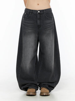 LEWKIN Ben Washed Wide Leg Jeans CL501 Black front crop shot on model showing mid-rise waistband, button closure, and extreme wide-leg washed denim silhouette