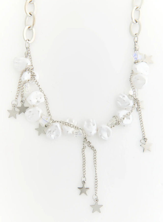 Blair Baroque Necklace IL522 silver flat lay front view displaying full baroque pearl strand chunky oval chain links and multiple star charm drops