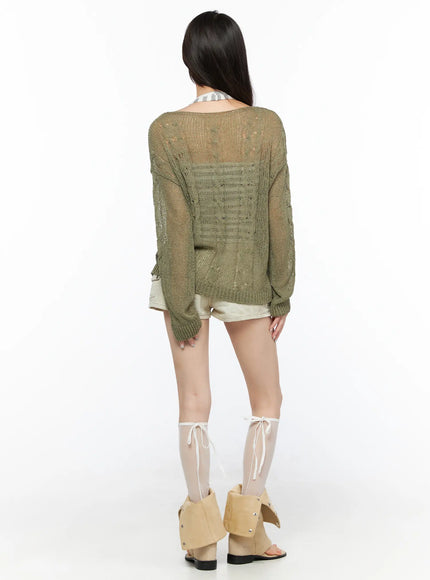 Boat Neck Sheer Cable Knit Top CL522 Dark green back model shot revealing open-knit distressed detailing and sheer cable pattern