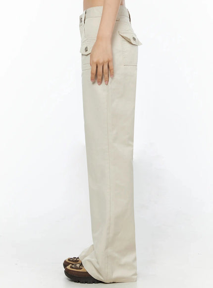Bootcut Cargo Pants IL516 Light beige side view on model, showing straight low-rise waist, side cargo pocket flap with snap button, and full flared leg length