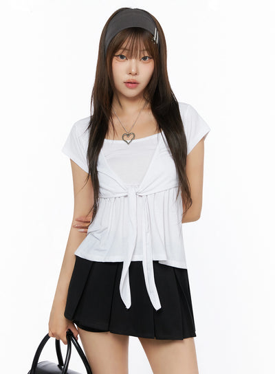 LEWKIN Bow-Detail Tank Set IL523 White S/M front shot on model wearing headband, front-tie bow detail, layered tank, soft jersey fabric, styled with black mini skirt
