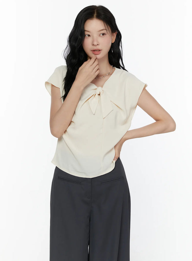 Bow Tie Cap Sleeve Blouse CL520 in Light beige, size S/M