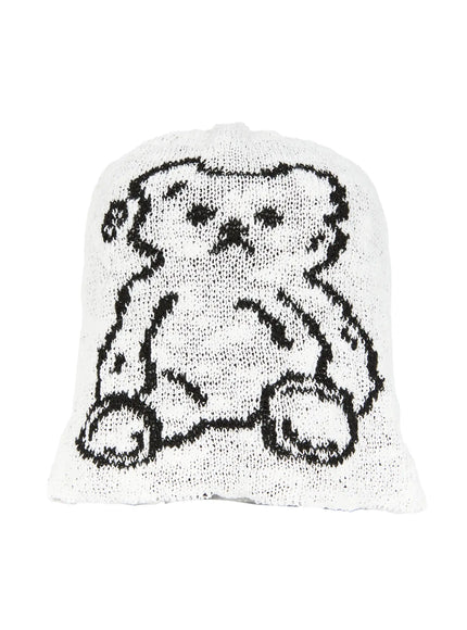 Brooks Bear Beanie IL503 White flat front product shot, black intarsia teddy bear graphic centered on loose open-knit white beanie