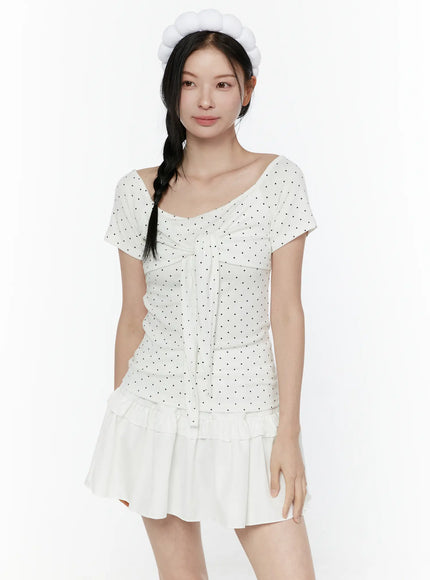 Bubble Headband IL506 White front shot model wearing white puffy bubble headband styled with braided hair and polka dot top