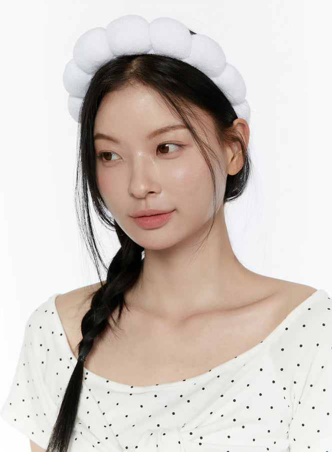 LEWKIN Bubble Headband IL506 White One Size close-up portrait model wearing puffy terry bubble headband with side braid hairstyle