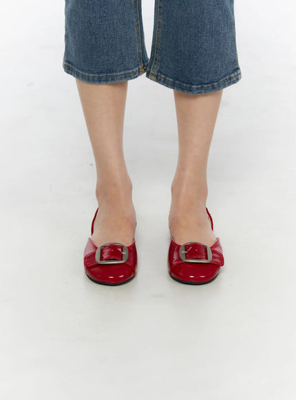 Buckle Detail Flats CU530 Red front shot on model wearing blue denim cropped jeans, patent leather square toe with oversized silver square buckle